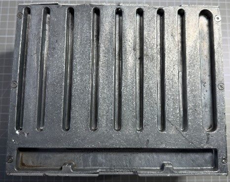 Flight Controller Unit (FCU) — Cast aluminium lid with cooling slots