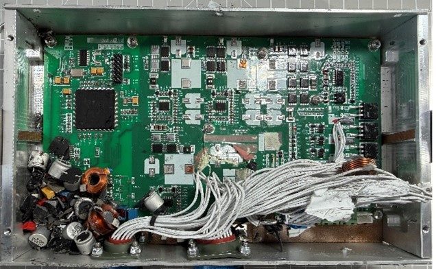 Power distribution unit (PDU) — Opened: processor board, power inductors, capacitors and wiring harness