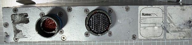 Power distribution unit (PDU) — End panel with two round military-style connectors and a blank name label