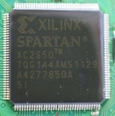 Programmable gate matrix, marked XILINX® SPARTAN® XC2S50 TM TQG144AMS 1129 A4277850A 5I