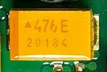 Tantalum capacitor, marked Δ476 E 20184