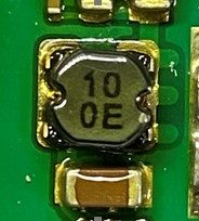 Inductance coil, marked 10 0E