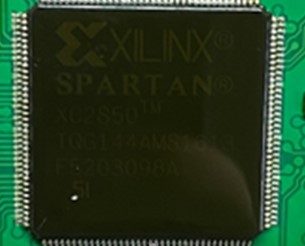 Screw matrix, marked XILINX SPARTAN XC2S50 TQG144AMS1613 F5203098A 5I