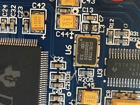 Clock oscillator, marked CTS17CB3 50M00000