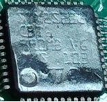 A 32-bit microcontroller, marked STM32F103CBT