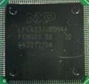 A 32-bit microcontroller, marked LPC4337JBD144 PSNG00.00 2D ESD21270A
