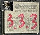 A 32-bit microcontroller, marked ESP32-PICO-MINI-02U