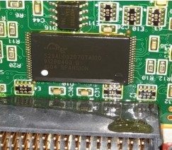 microcircuit, marked S29AL032D7OTA100 912BB403 G 04